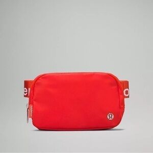 Lululemon Everywhere 1L Belt Bag Orange & White with Logo Strap